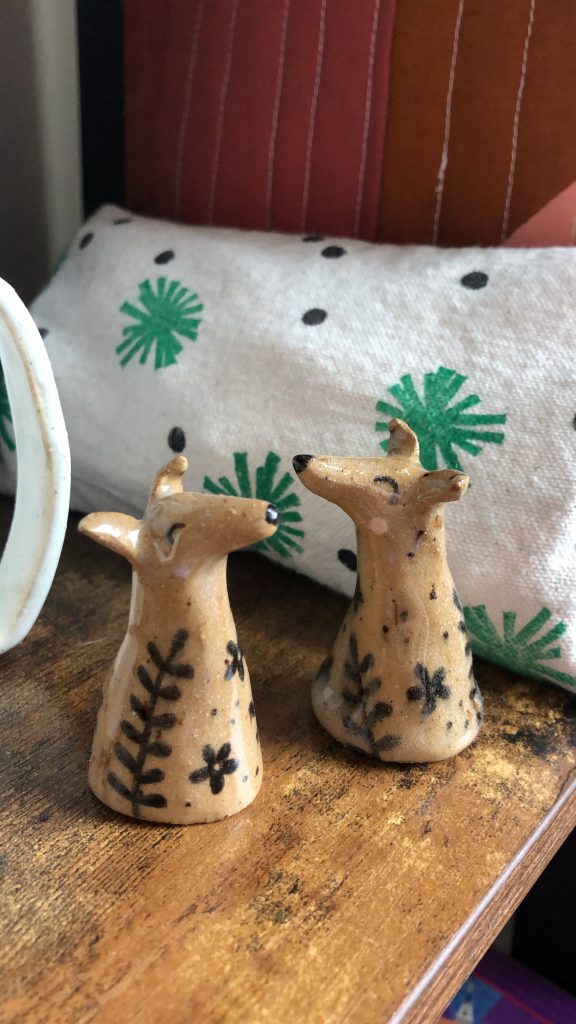 Two ceramic greyhound figurines