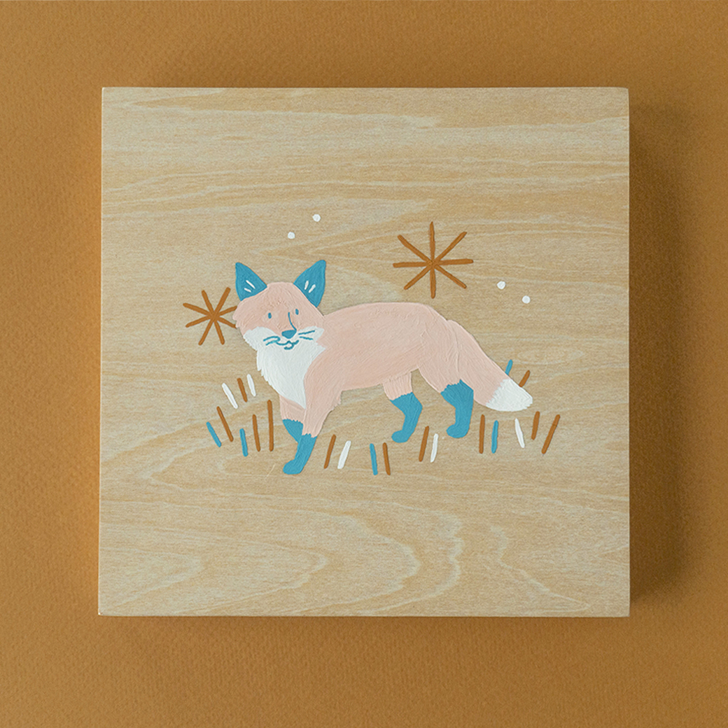 A gouache painting of a pink fox on a wood panel canvas